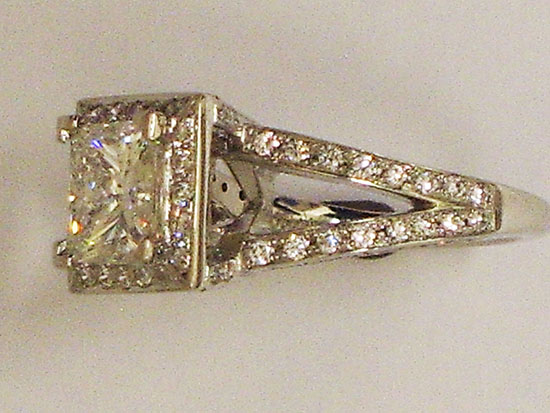 Princess cut Diamond engagement ring with baguette diamonds